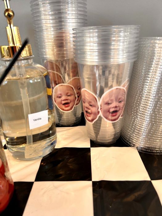 Clear party cups with custom photo face cutouts